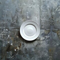 A white plate on a blue textured background