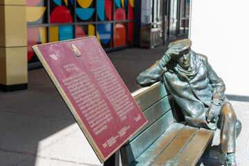 Obraz premium Glenn Gould by Ruth Abernethy with Historic Sites and Monuments Board of Canada located in front of CBC Headquarters 250 Front Street West in Toronto, Canada - focus on plaque