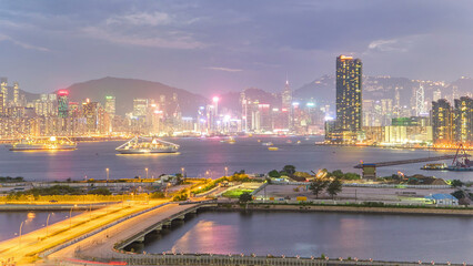 Hong Kong day to night, aerial view from Kowloon bay downtown timelapse - obrazy, fototapety, plakaty