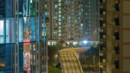 Top view of busy traffic night in finance urban timelapse, Hong Kong city