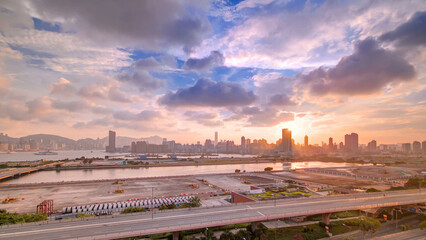 Top view of sunset in Hong Kong from kowloon bay downtown timelapse