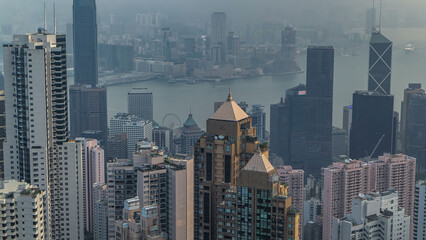 Fototapeta na wymiar View of Hong Kong from Victoria peak in a foggy morning timelapse.