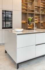 Fototapeta na wymiar Elegant modern bright kitchen in a kitchen showroom