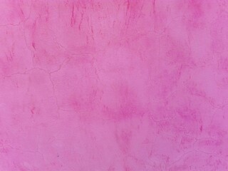 Concrete pink plastered wall. Bright purple grunge texture background. Beautiful decorative...