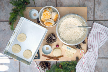 Baking setup with dough and festive holiday decorations
