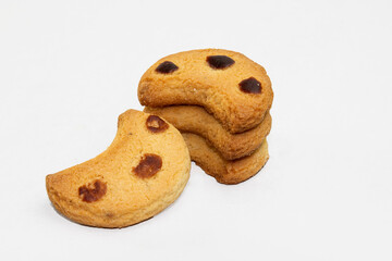 Chanda Biscuit. three Brown caramel dots on it. this biscuits are popular and traditional bakery item in Chittagong. consume with tea as morning and evening snacks.