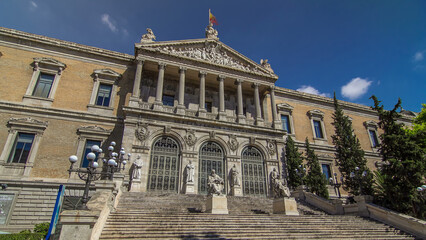 Fototapeta premium National Library of Spain timelapse hyperlapse. It is located in Madrid, on the Paseo de Recoletos.