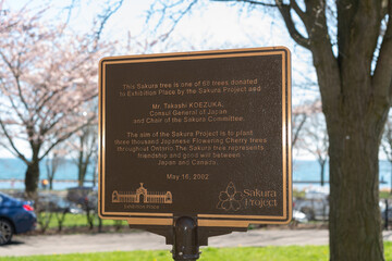 Obraz premium plaque with inscription at Exhibition Place Sakura Project near The Government of Ontario Building (Liberty Grand Entertainment) in Toronto, Canada