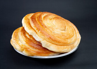 Danish pastry on black background,