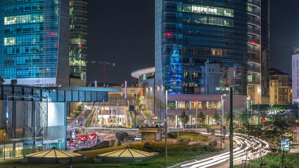 Milan skyline with modern skyscrapers in Porta Nuova business district night timelapse in Milan,...
