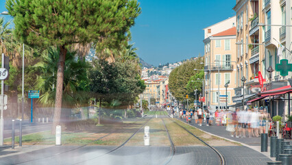 Boulevard Jean Jaures on a sunny day with tram going up and down timelapse. Nice, France