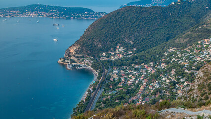 Morning timelapse view of the Mediterranean coastline of the town of Eze village on the French Riviera - obrazy, fototapety, plakaty