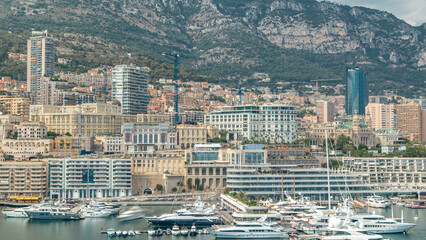 Monte Carlo city aerial panorama timelapse. View of luxury yachts and buildings in harbor of...