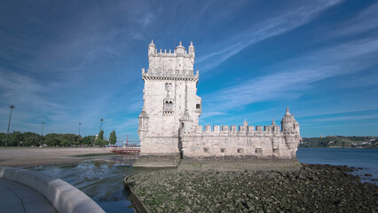 Belem Tower is a fortified tower located in the civil parish of Santa Maria de Belem in Lisbon, Portugal timelapse hyperlapse - obrazy, fototapety, plakaty