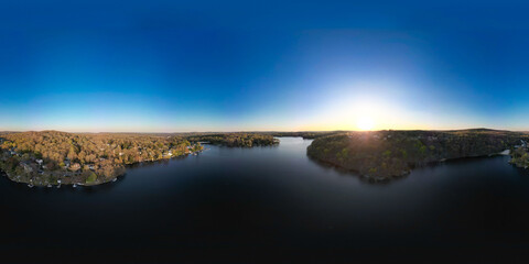 Experience a tranquil escape with these serene drone views of White Meadow Lake, New Jersey. The...