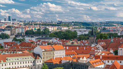 Fototapeta na wymiar Panorama of Prague Old Town with red roofs timelapse, famous bridges and Vltava river, Czech Republic.