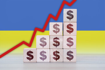 Ukraine economic collapse, increasing values with cubes, financial decline, crisis and downgrade concept