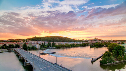 The View on Prague Hill Petrin timelapse with Owl's Mills after Sunset with beautiful colorful sky,...