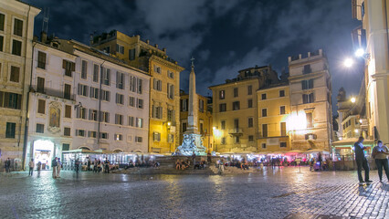 View of Rotonda square and Fountain timelapse near Pantheon at night light. Rome, Italy