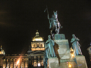 Looking up at the statue of Saint Wenceslas at night with the neoclassical building of the Czech National Museum in the background in Prague, Czech Republic.