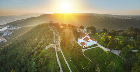 Drone aerial view on Castle of Sesimbra, national monument in Setubal district in Portugal.