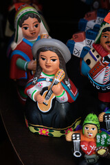Colorful fabric or ceramic Peruvian handicrafted souvenirs