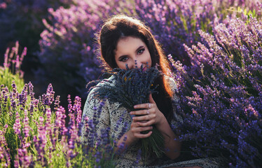 young woman in a blooming lavender field