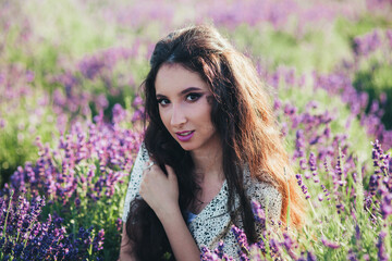 young woman in a blooming lavender field