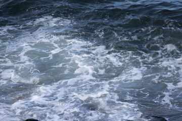 Ocean hitting a rocky shore