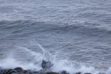 Ocean hitting a rocky shore