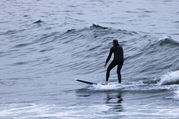 Surfer riding the ocean waves
