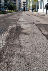 Damaged road prepared by  asphalt milling and grinding scraper machine for road repair. Street...