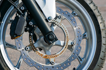 ventilated brake disc of the front wheel of a sports motorcycle. rust