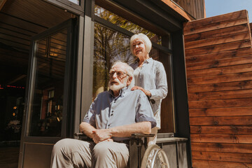 Senior couple, wife takes care of invalid husband