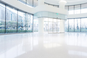 Fototapeta premium Industrial building interior consist of polished concrete floor and closed door for product display or industry background.