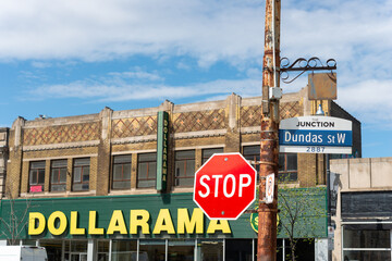 Obraz premium exterior of historic building facade and sign of Dollarama located at 2890 Dundas Street West in Toronto's Junction neighborhood