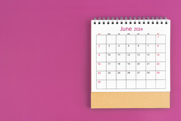 June 2024, Monthly desk calendar for 2024 year on purple background.
