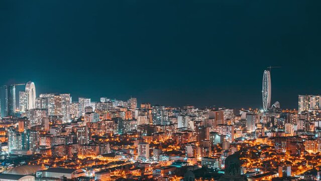 Batumi, Adjara, Georgia. Aerial View Of Urban Cityscape Skyline At Night. evening night time lapse