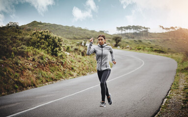Road, running or woman with speed for fitness, exercise or training outdoors with endurance for...
