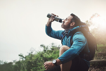 Backpack, man and drinking water for travel for outdoor with a hydration from adventure. Exercise,...