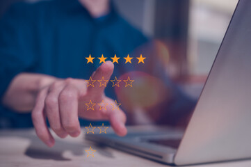 customer service satisfaction survey concept, Businessman working with computer and pressing on virtual five stars