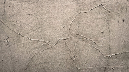 Grunge background of shabby wall with cracked paint layer. Backdrop with copy space for design....