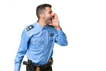 Young police caucasian man over isolated background shouting with mouth wide open to the side