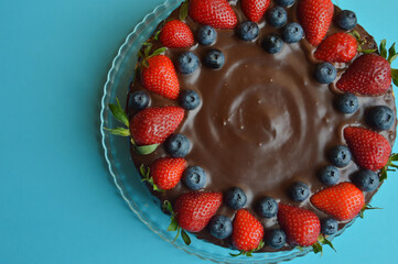 cake with berries, strawberries, blueberries. homemade cakes for the holiday, birthday, mother's day, Valentine's day. sweet dessert. background for the design.