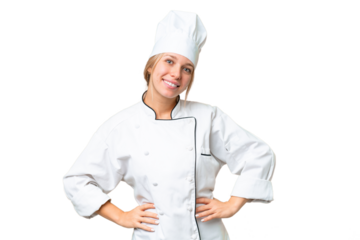 Young chef woman over isolated chroma key background posing with arms at hip and smiling