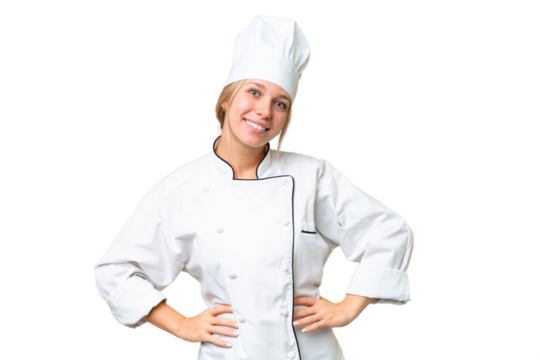 Young chef woman over isolated chroma key background posing with arms at hip and smiling