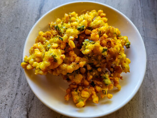 Perkedel jagung or bakwan jagung, food made from corn fritters with mixed vegetables, Indonesian traditional food