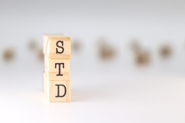 STD acronym. Concept of Sexually Transmitted diseases text isolated on white background.