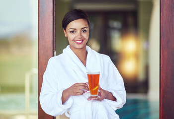 Portrait, woman and smile at spa with tea on holiday, relax and break for luxury and mindfulness....