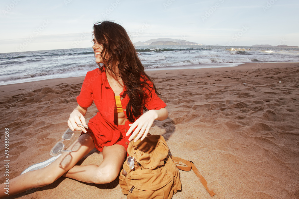 Poster Travel Joy: Woman Backpacking in Nature, Enjoying the Beach Bliss amidst the Sea and Sand